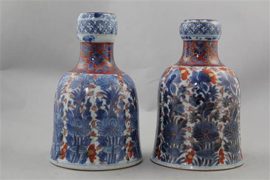 Two Chinese underglaze blue and iron red enamelled bell shaped huqqa bases, Kangxi period, 18cm. and 18.5cm.